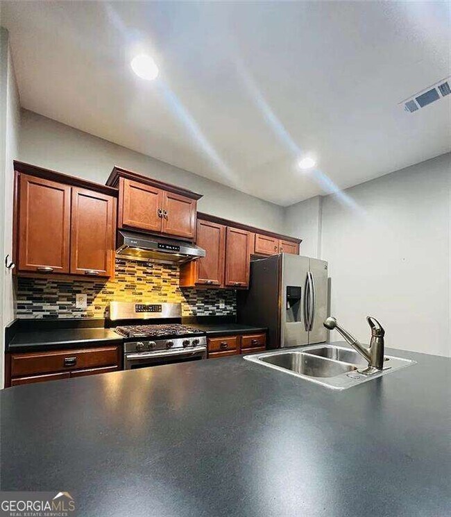 Foto del edificio - 6996 Kingswood Run Dr