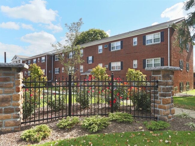 Professional Landscaping Along the Path Between Buildings - Society Hill at Lehigh Park