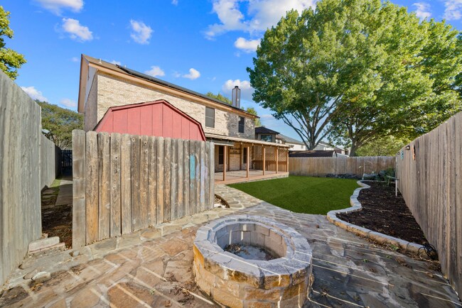 Foto del edificio - Sign your lease and receive a FREE 50" TV!!!  "Spacious 4-Bedroom Retreat with Fireplace in Charm...