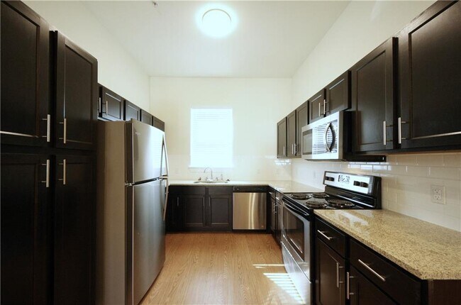 Building Photo - 2400 Louis Henna Blvd