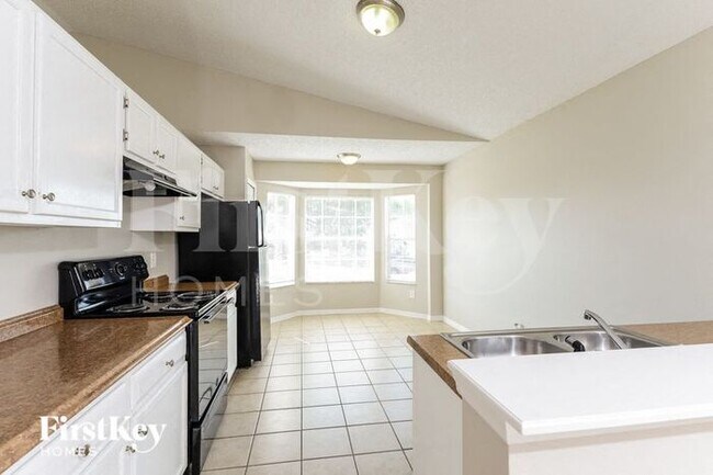 Foto del edificio - 7547 Groveoak Dr