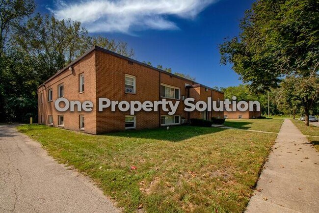 Building Photo - 809 E 32nd Ave
