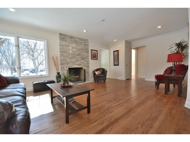 Natural fireplace in living room - 12930 W Colfax Pl