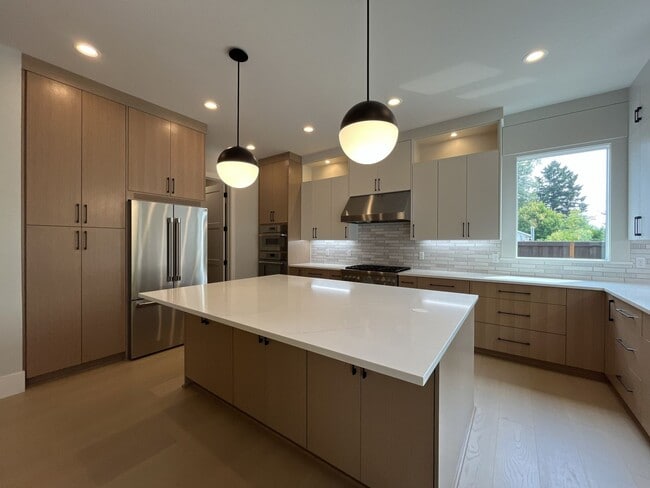 Building Photo - Brand-New 5-Bedroom Home with Main-Level Suite, Gourmet Kitchen, Luxury Finishes & Covered Patio