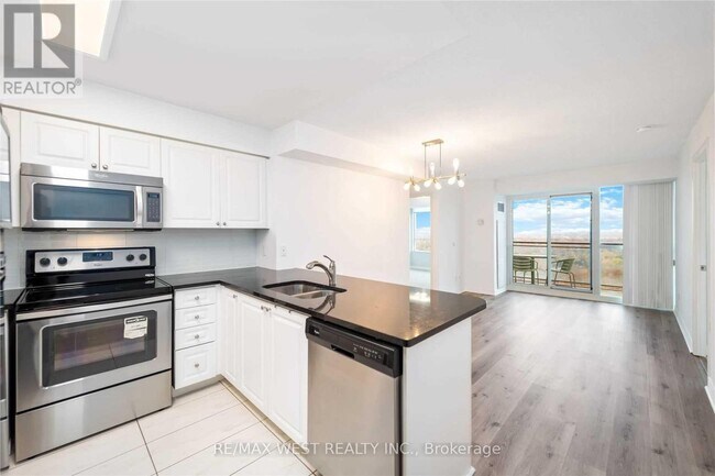 Photo du bâtiment - 88-2688 Grangeway Ave