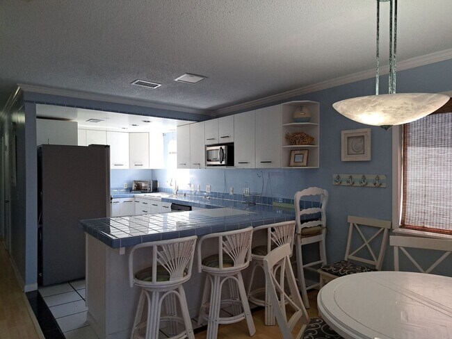 Foto del edificio - 6912 Beach Dr