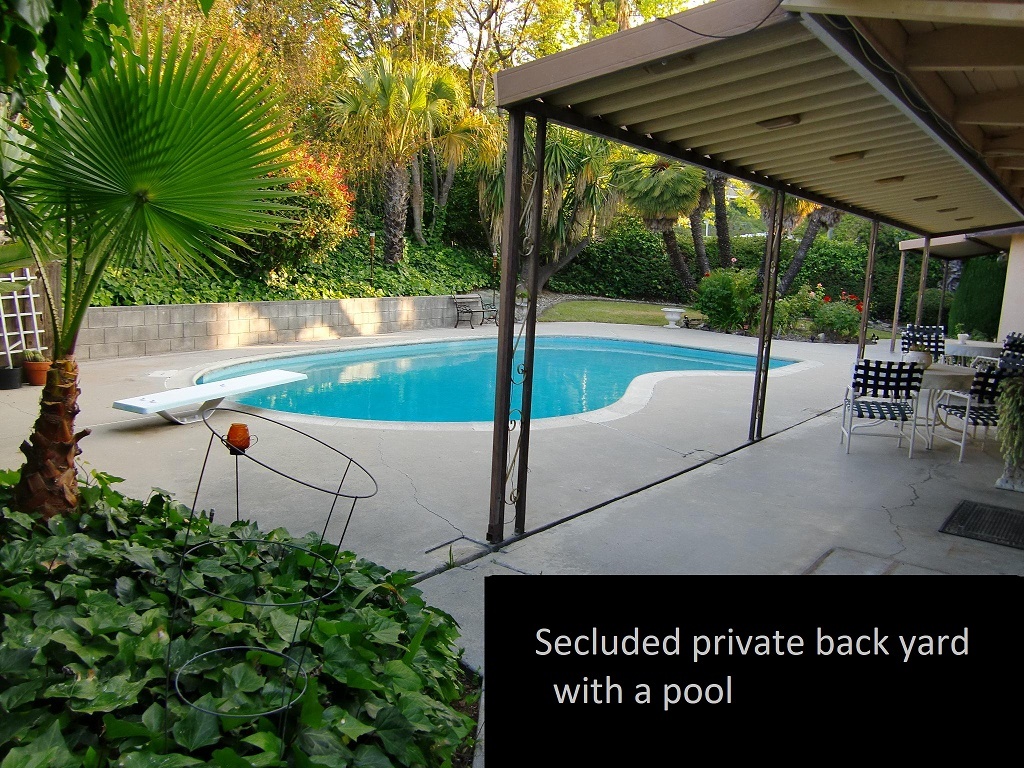 Fully secluded private back yard with pool - 24326 Caris St