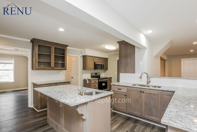 Building Photo - Now available 4 bedrooms 2.5 baths