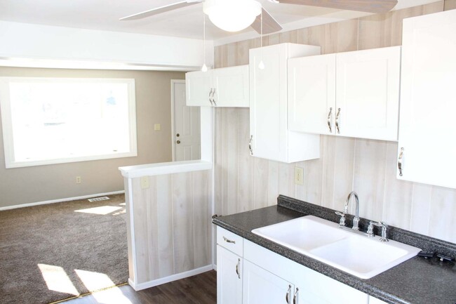 Building Photo - Updated 4 bedroom east side home with addi...