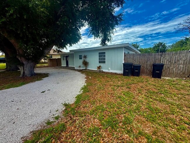 Building Photo - Charming Coastal Cottage with Huge Fenced Yard & Smart Tech!