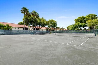 Building Photo - 10656 Tropic Palm Ave