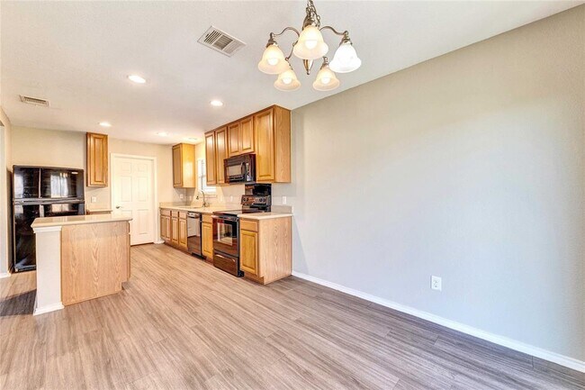 Building Photo - 5601 Sunday Silence Dr