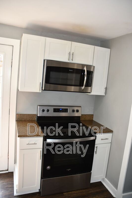 Foto del edificio - 211 W 10th St