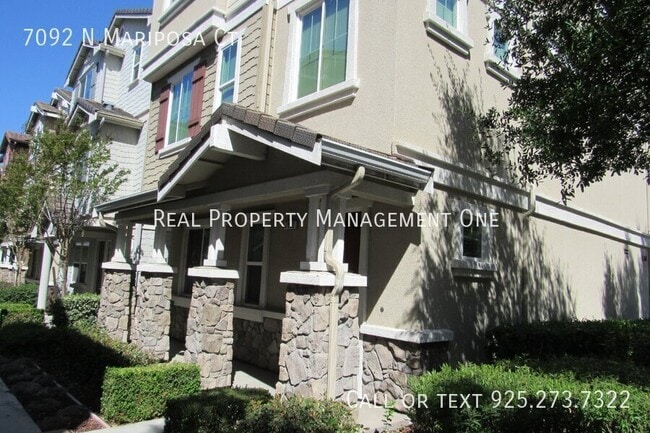 Building Photo - 7092 N Mariposa Ct