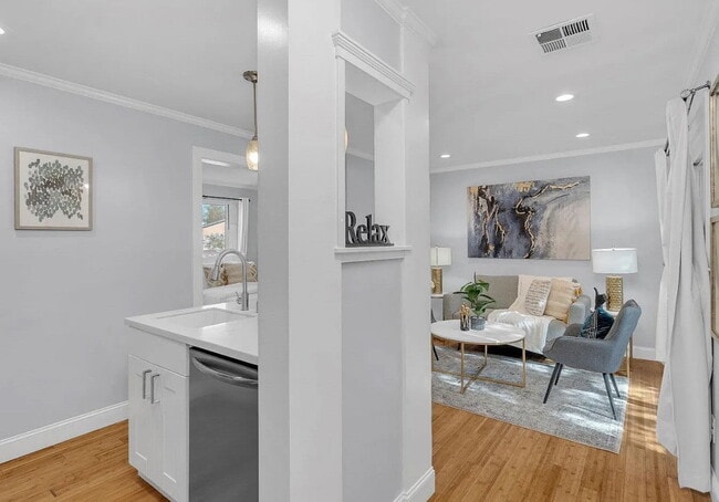 Building Photo - Welcome to a stylish one-bedroom, one-bath...