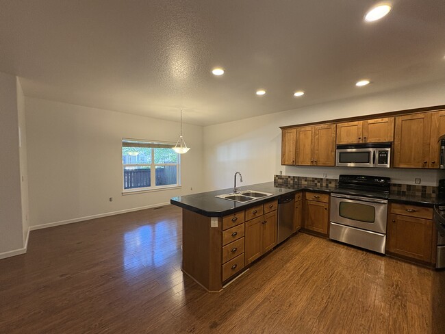 kitchen and dining room - 2066 NW Yohn Ranch Drive