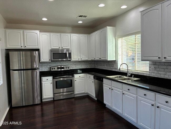 Building Photo - 14240 W Country Gables Dr