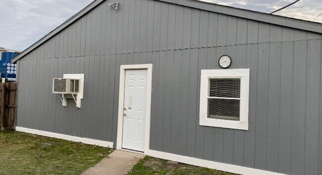 Back door to garage and mother in law suite. - 1240 Westmoreland Dr.