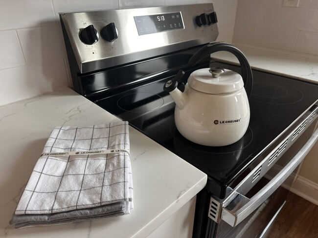 Bright, modern kitchen. What you see is what you get—move-in ready. - 55 Providence Ave