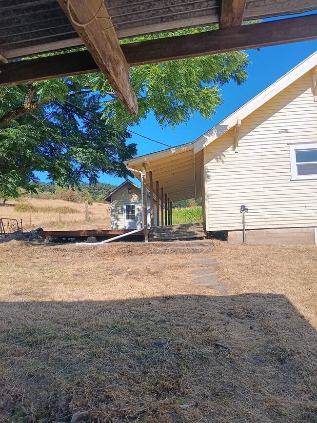 Building Photo - Beautiful Secluded Farmhouse & Shop is Available!