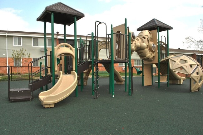 Community playground with outdoor recreation space for residents and families - Oliver Crossing