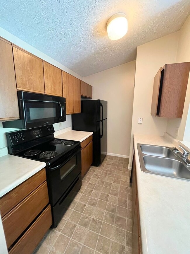 Photo - Beautiful 2BR/2BA Condo with Pool, Fitness Center & Private Balcony