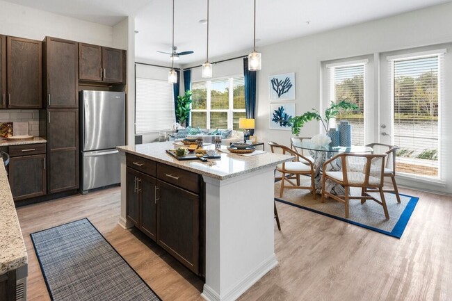 Chef-inspired kitchens with spacious open-concept floorplans - The Reef Apartments