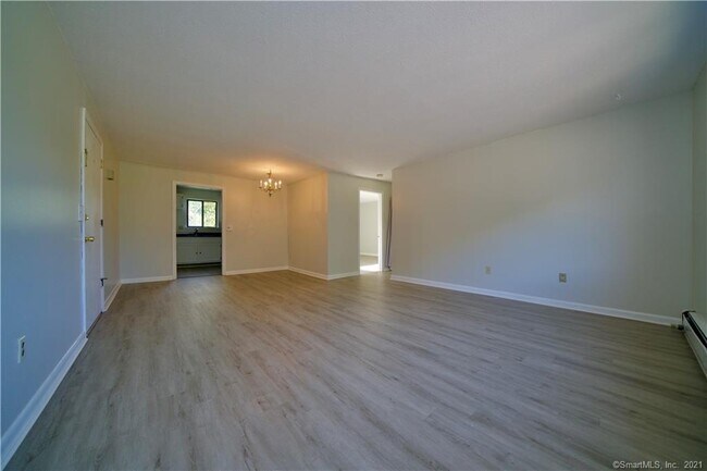 Living area with brand new flooring - 317 High Path Rd