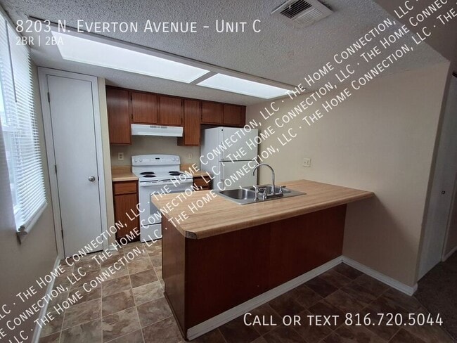 Building Photo - 8203 N Everton Ave