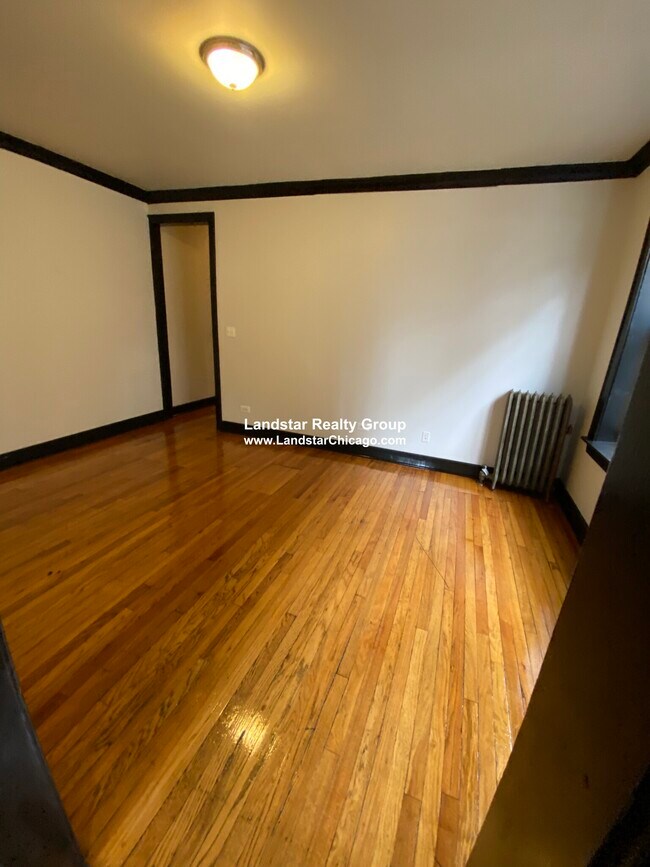 Foto del edificio - 6411 N Lakewood Ave
