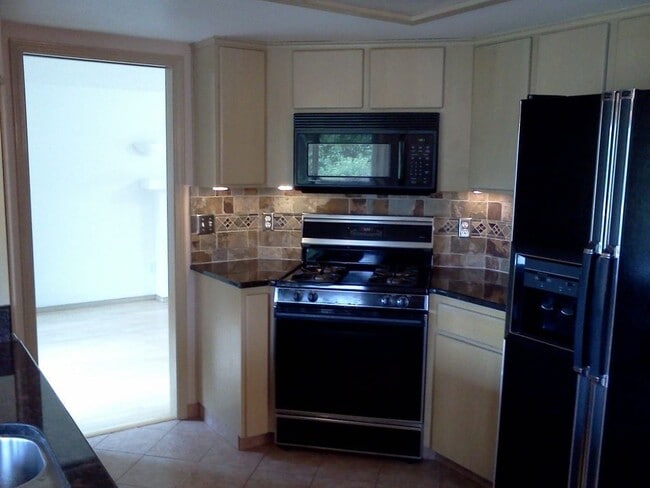 Building Photo - 12470 SW Winter Lake Dr
