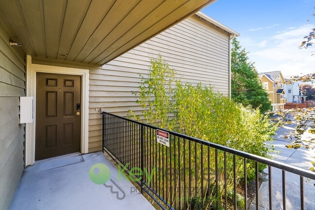 Building Photo - **Rent Special** Remodeled Two-Bedroom with Open Floor Plan, Parking, and Easy Transit Access