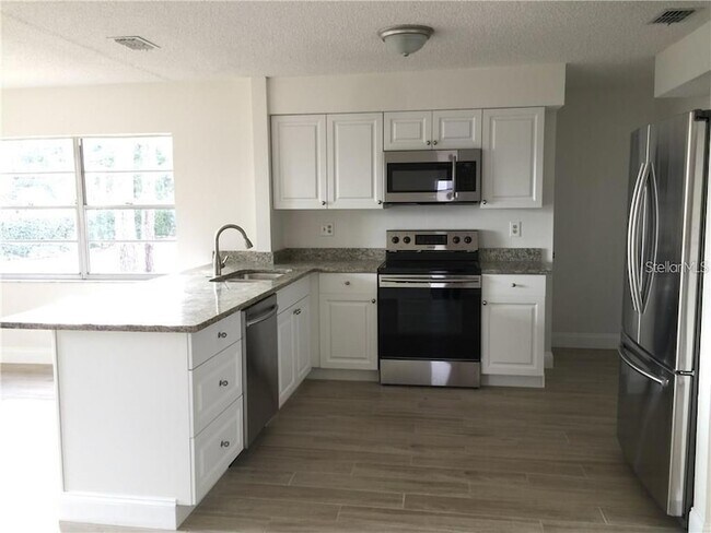 Foto del edificio - 8484 Belmont Rd