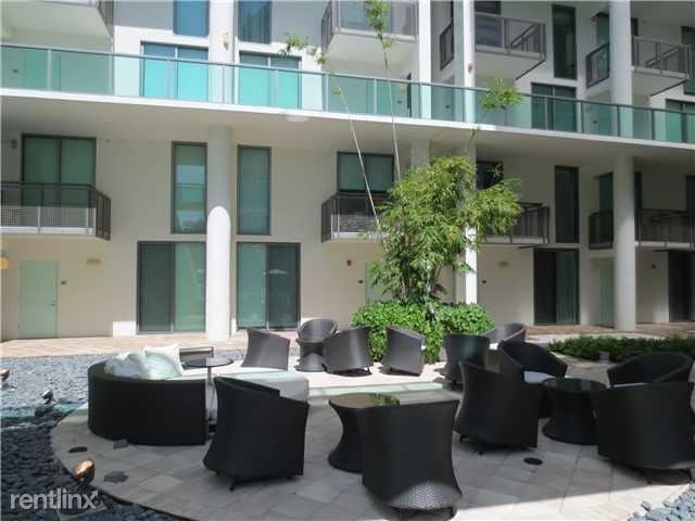 Building Photo - 2 br, 2.5 bath Condo - 6000 Collins Ave Lo...
