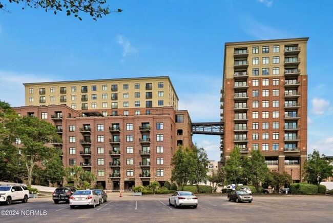 Building Photo - Welcome to your dream condo in the heart o...