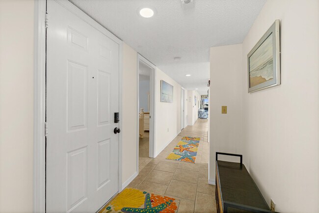 Building Photo - 5803 N Banana River Blvd