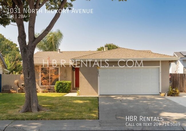 Building Photo - Tracy Three Bedroom Home - Adorable Single...