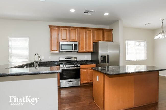 Building Photo - 7600 Scarlet Tapestry Ct