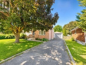Building Photo - 307 Springbank Ave N