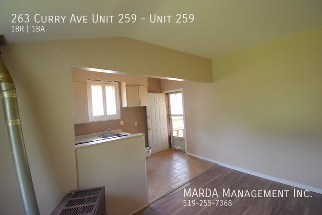 Building Photo - COZY 1-BEDROOM/1BATH MAIN FLOOR APARTMENT ...