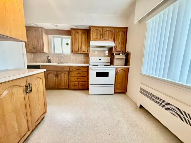 Photo du bâtiment - 473 E 54th Ave