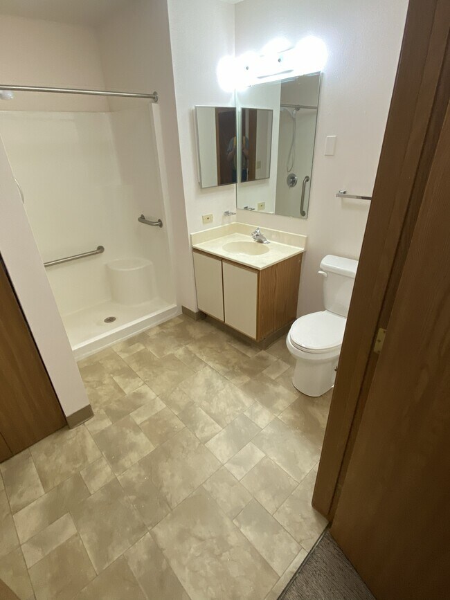 Baño típico - Sunshine Apartments