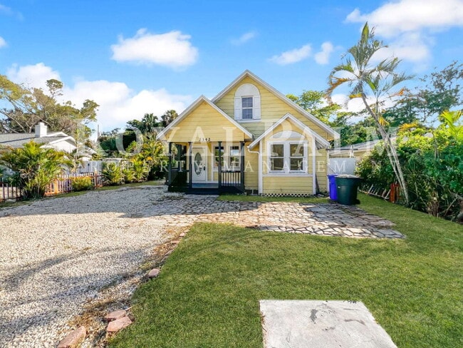 Building Photo - Deck the halls or the French doors, because this charming century-old single family home is avail...
