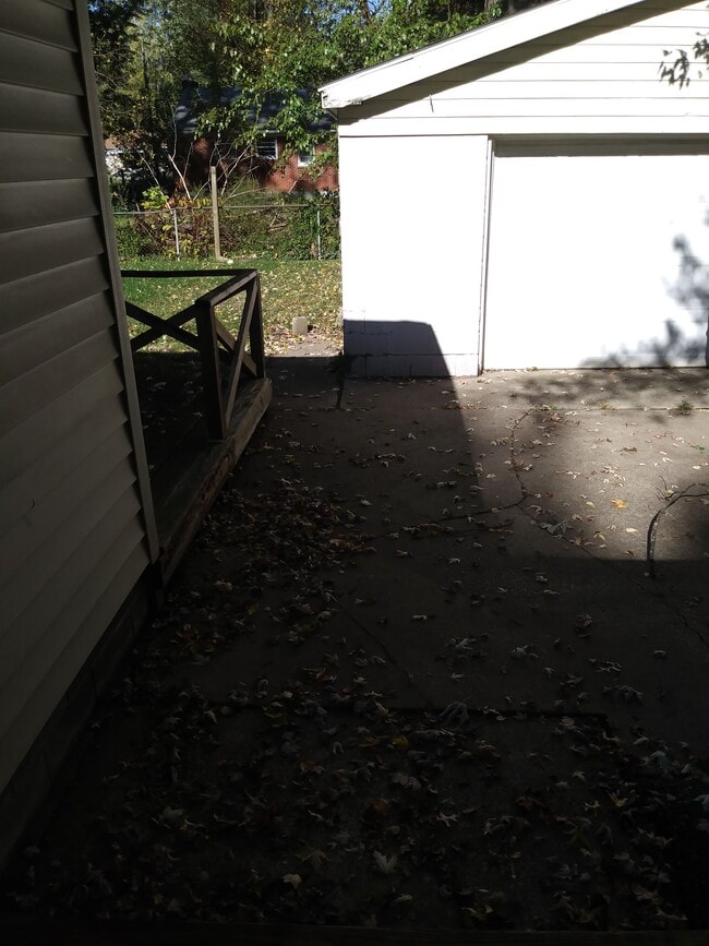 Driveway view of deck, back yard and garage - 2609 Pioneer Rd