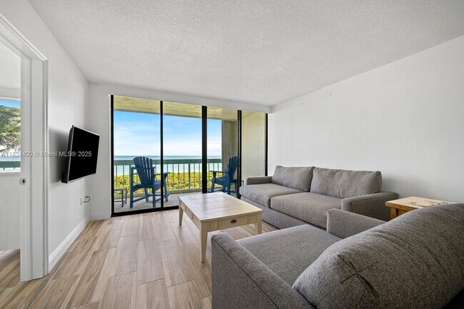 Building Photo - 9940 S Ocean Dr
