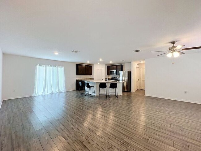 Building Photo - Spacious Open-Concept Living with Modern Finishes in Villate 7 Poinciana