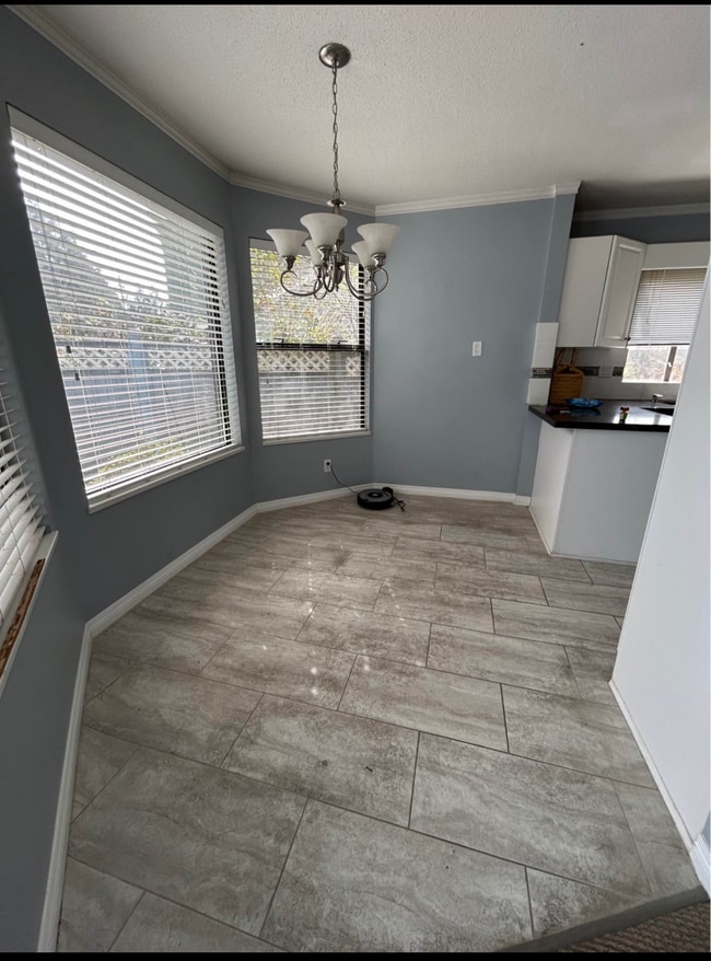 Building Photo - spacious 4-bedroom, 2-bathroom upper home ...