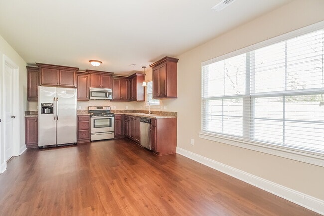 Foto del edificio - 8427 Manor Farm Dr