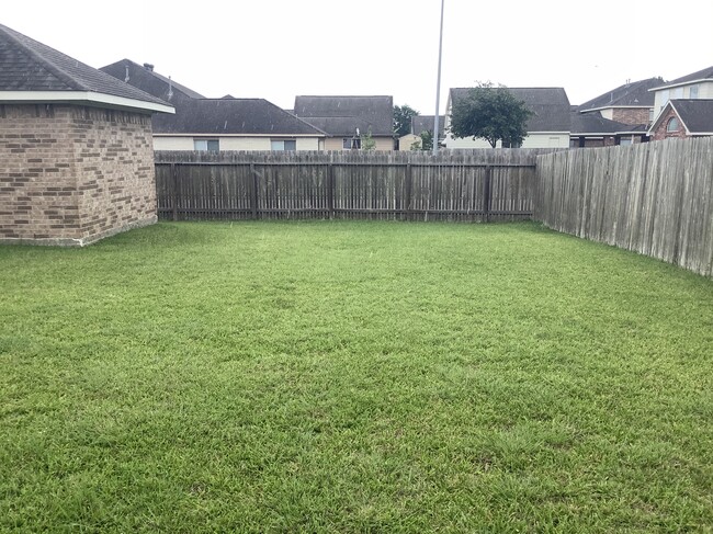 Another view of the backyard. No neighbors to your side. Corner lot. - 11502 Grimes Ave.