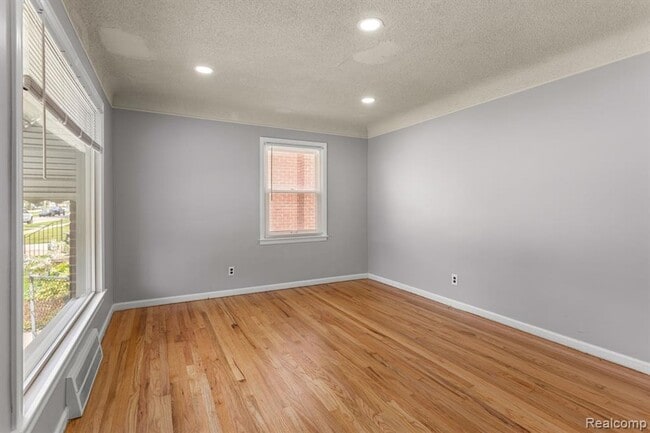 Building Photo - Cozy & Modern: 2-Bed Brick Home with Garage & Finished Basement